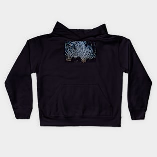 Starry night sky, startrails between trees landscape Kids Hoodie